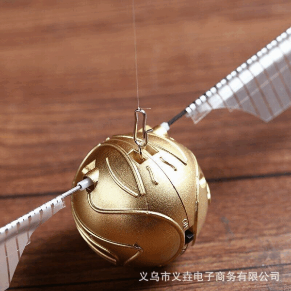 harry potter flying golden snitch flapping wings ball controlled by rope